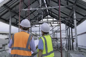 Facility building construction showing structural steel and multi-phase work