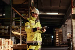 HSE safety advisor conducting field observation on industrial site