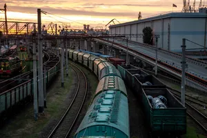 Rail inspector walking the track to document defects