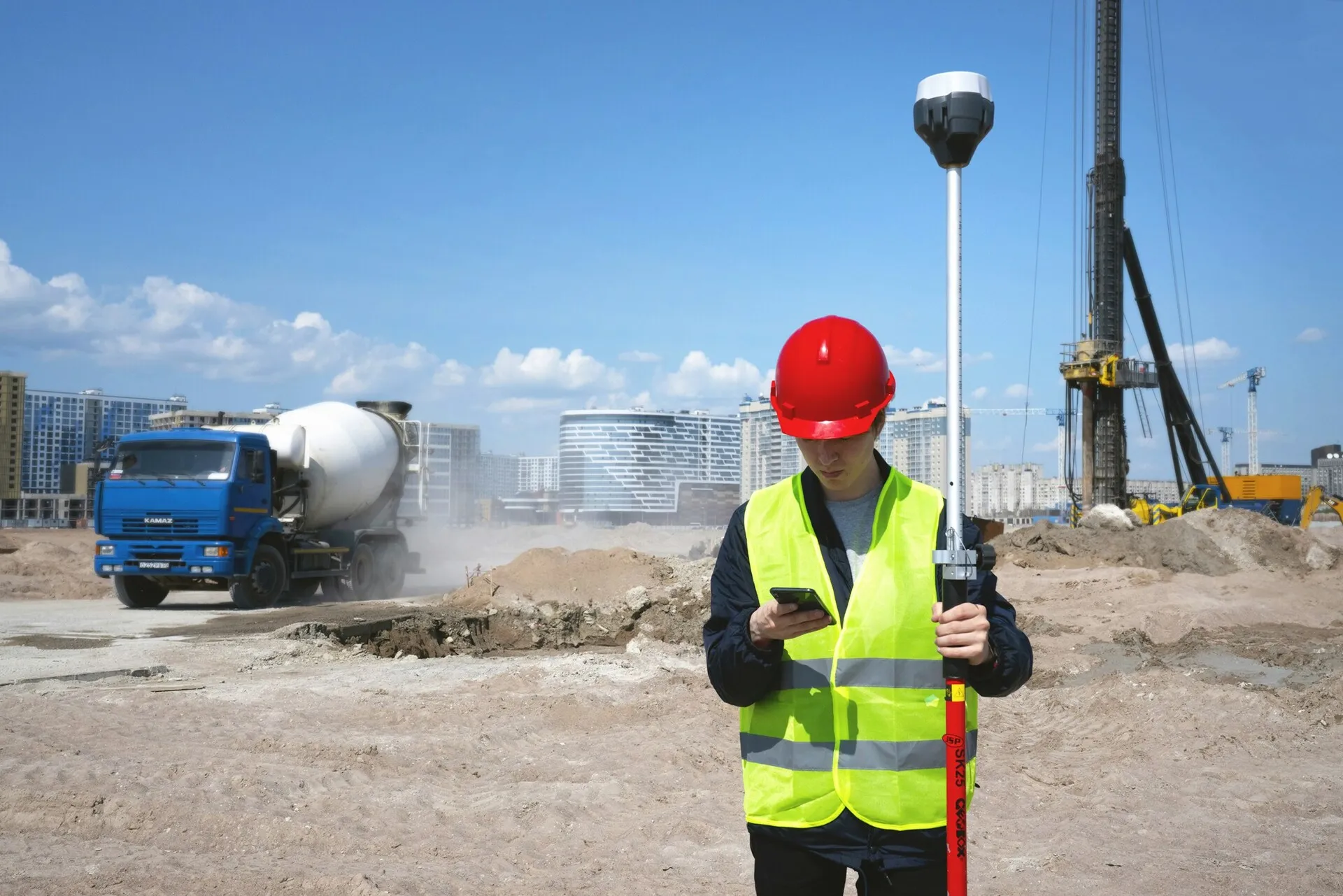 Field crew member using a tablet on a job site